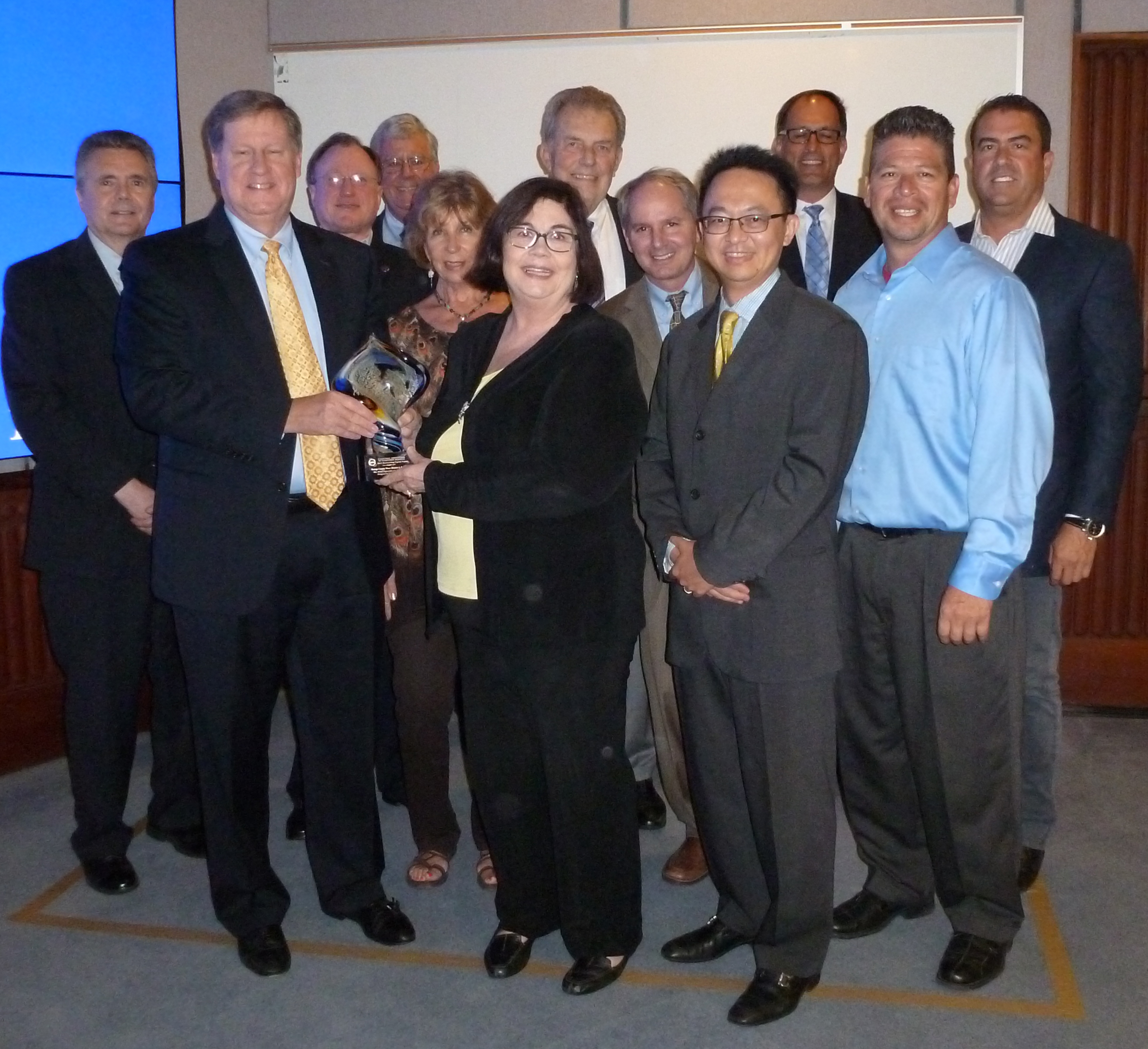 Board members and general managers from OCWD and OCSD accept the CASA Achievement Award at the Sept. 16 OCWD Board Meeting